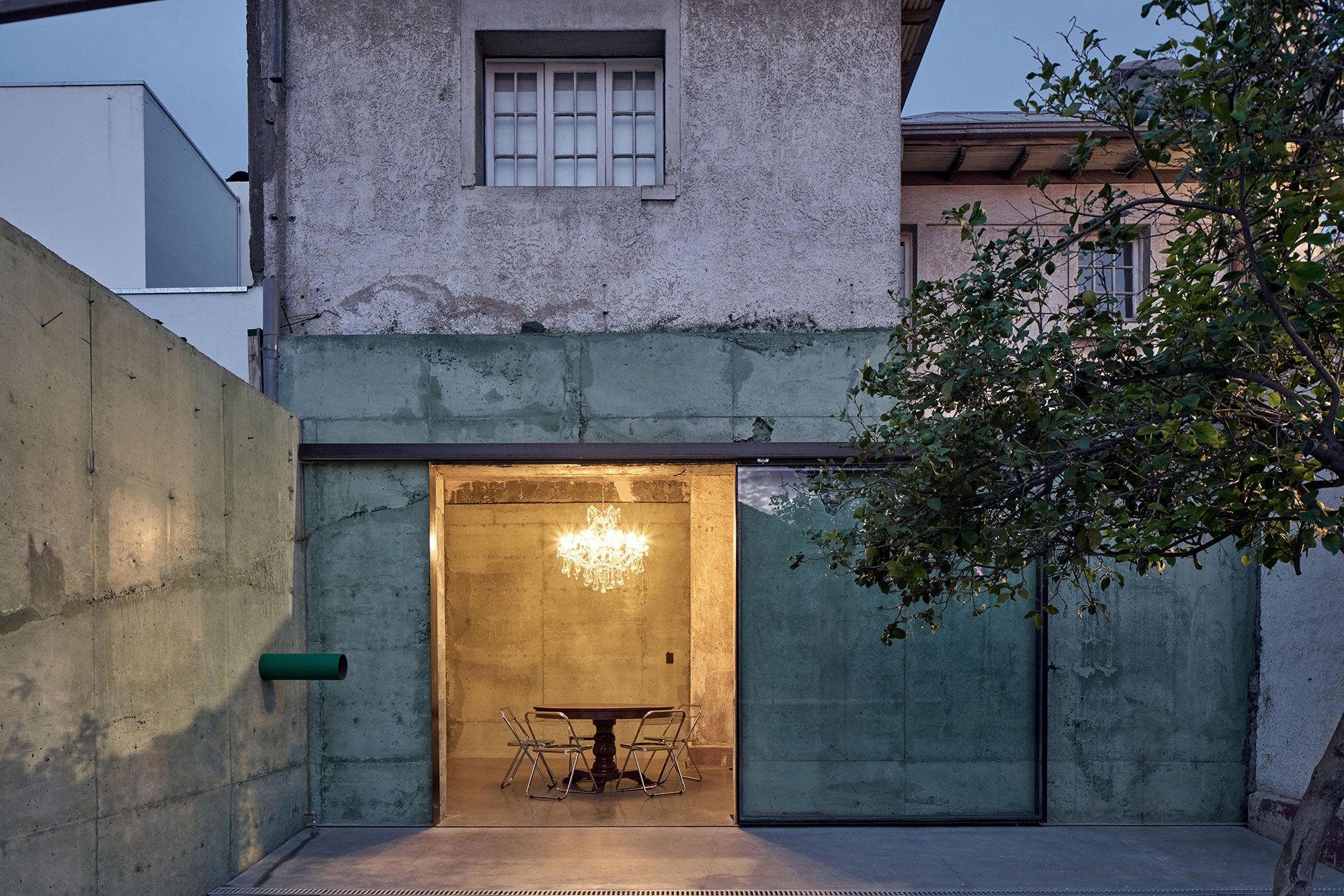 The private room, lit at dusk.
